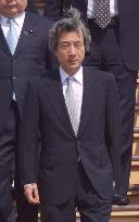 Koizumi returns home after Asia-Europe summit